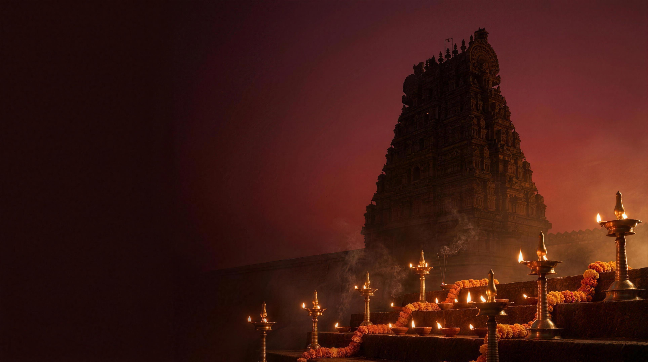 Temple at dusk with oil lamps